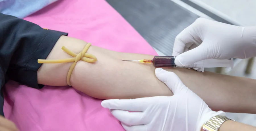 Blood sample being collected for estradiol and FSH hormone testing