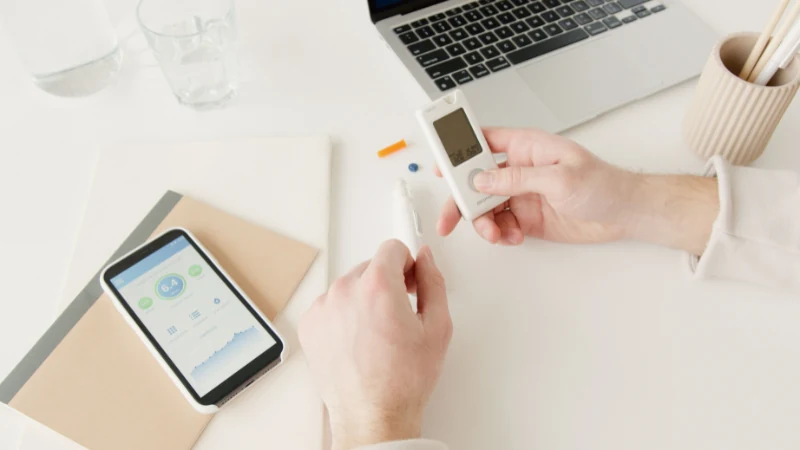 Person reviewing lab results on a phone or tablet at home