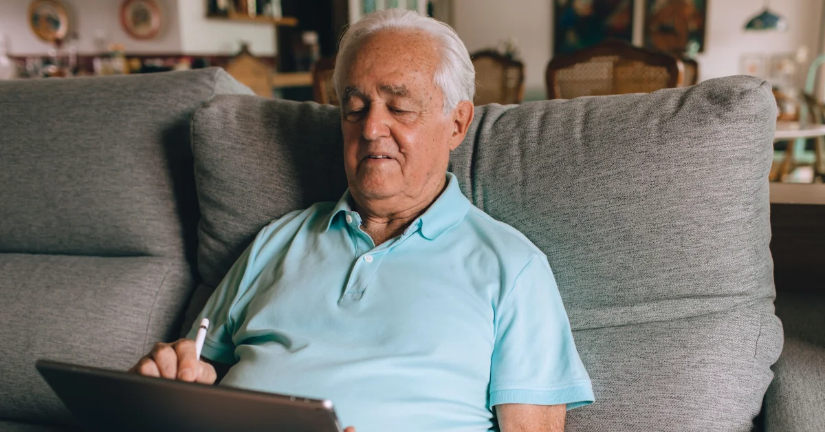 Older adult resting thoughtfully in an armchair