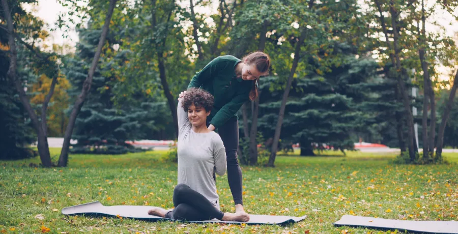 A person doing gentle stretching or a short walk outdoors, calm and realistic