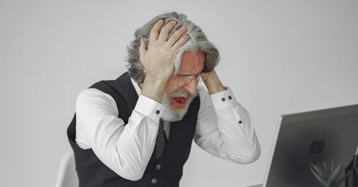 Person struggling to concentrate because of brain fog