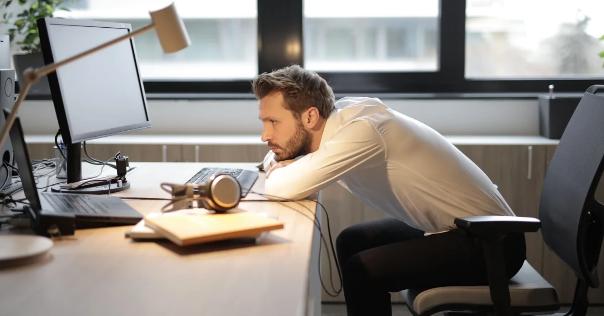 Person struggling to concentrate because of brain fog